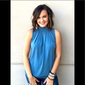 Soft sleeveless banded tank. Perfect 4 work or fun